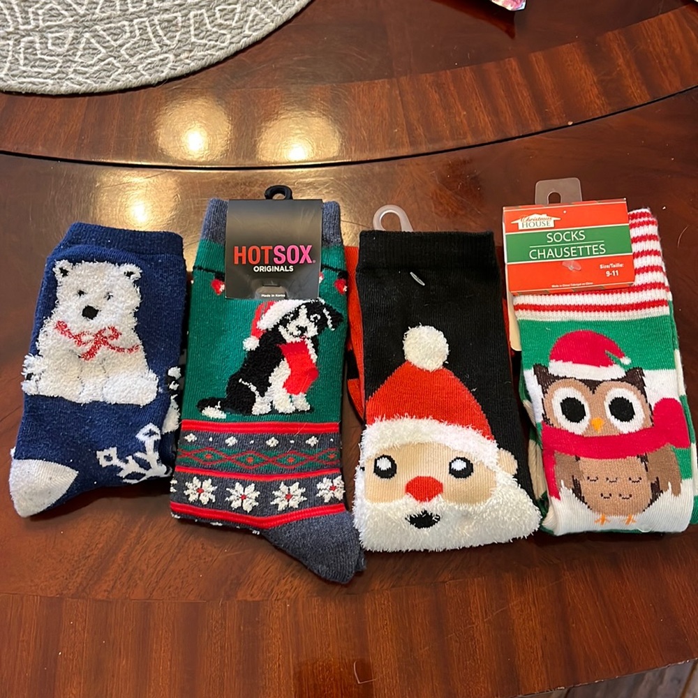 4 Pair of Holiday Socks. 3 NWT. Super cute holiday themes/designs.